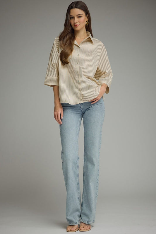 Stripe ¾ sleeve top featuring front pocket detail