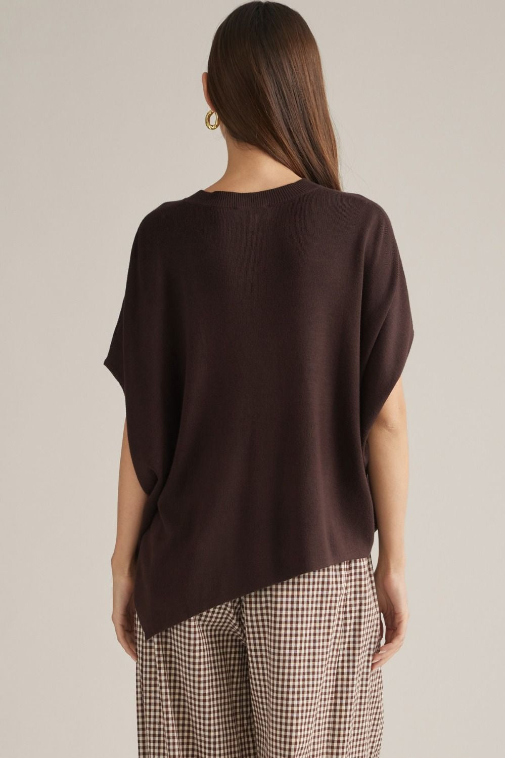 Solid short poncho sleeve sweater top with a round neckline