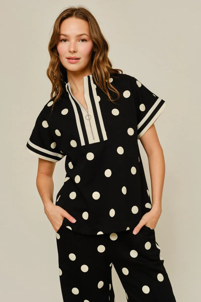 Drop shoulder front zip up polka dot top and bottom with color rib band accent, mock neck