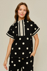 Drop shoulder front zip up polka dot top and bottom with color rib band accent, mock neck