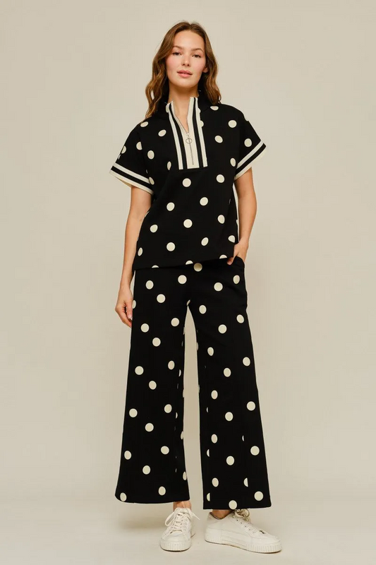 Drop shoulder front zip up polka dot top and bottom with color rib band accent, mock neck