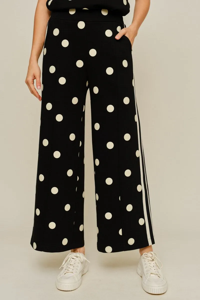 Drop shoulder front zip up polka dot top and bottom with color rib band accent, mock neck