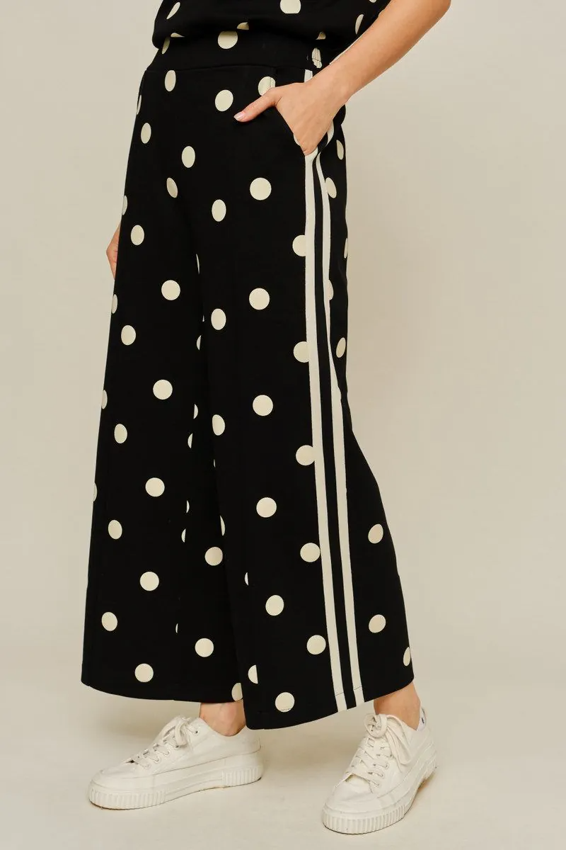 Drop shoulder front zip up polka dot top and bottom with color rib band accent, mock neck