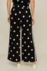 Drop shoulder front zip up polka dot top and bottom with color rib band accent, mock neck