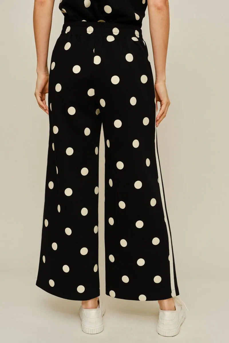 Drop shoulder front zip up polka dot top and bottom with color rib band accent, mock neck