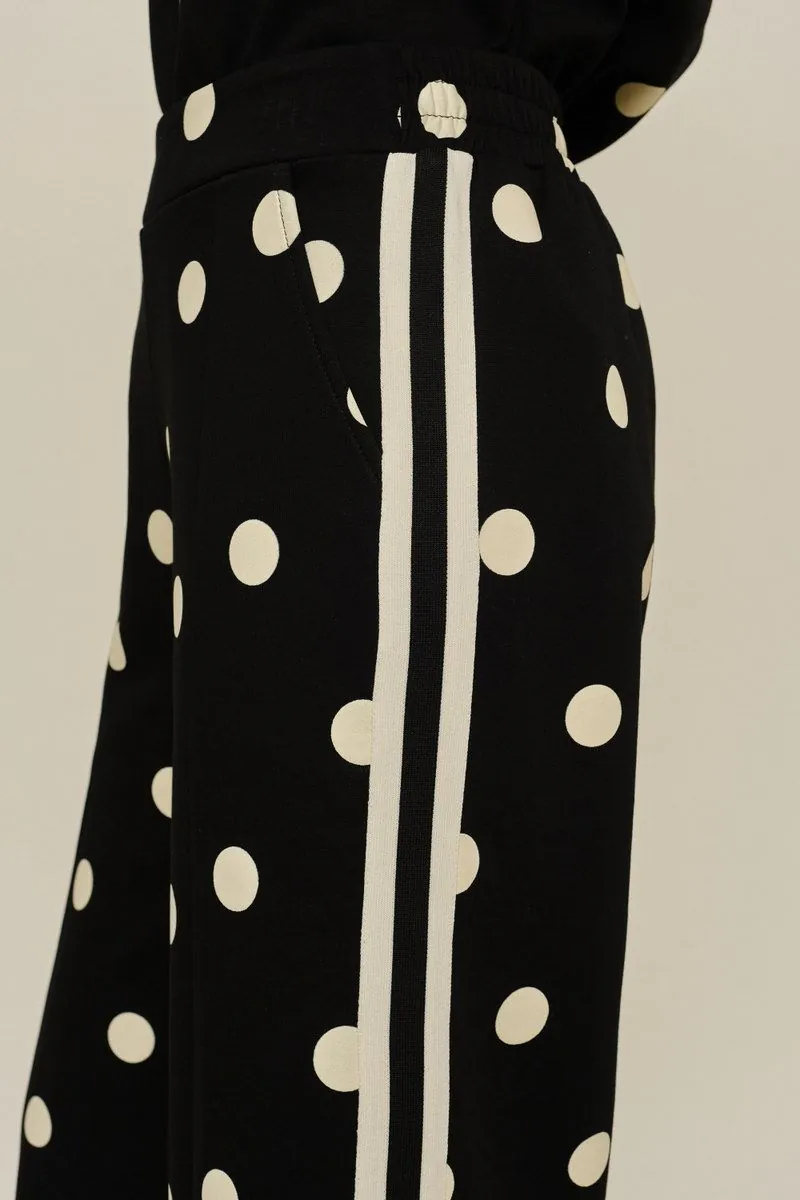 Drop shoulder front zip up polka dot top and bottom with color rib band accent, mock neck