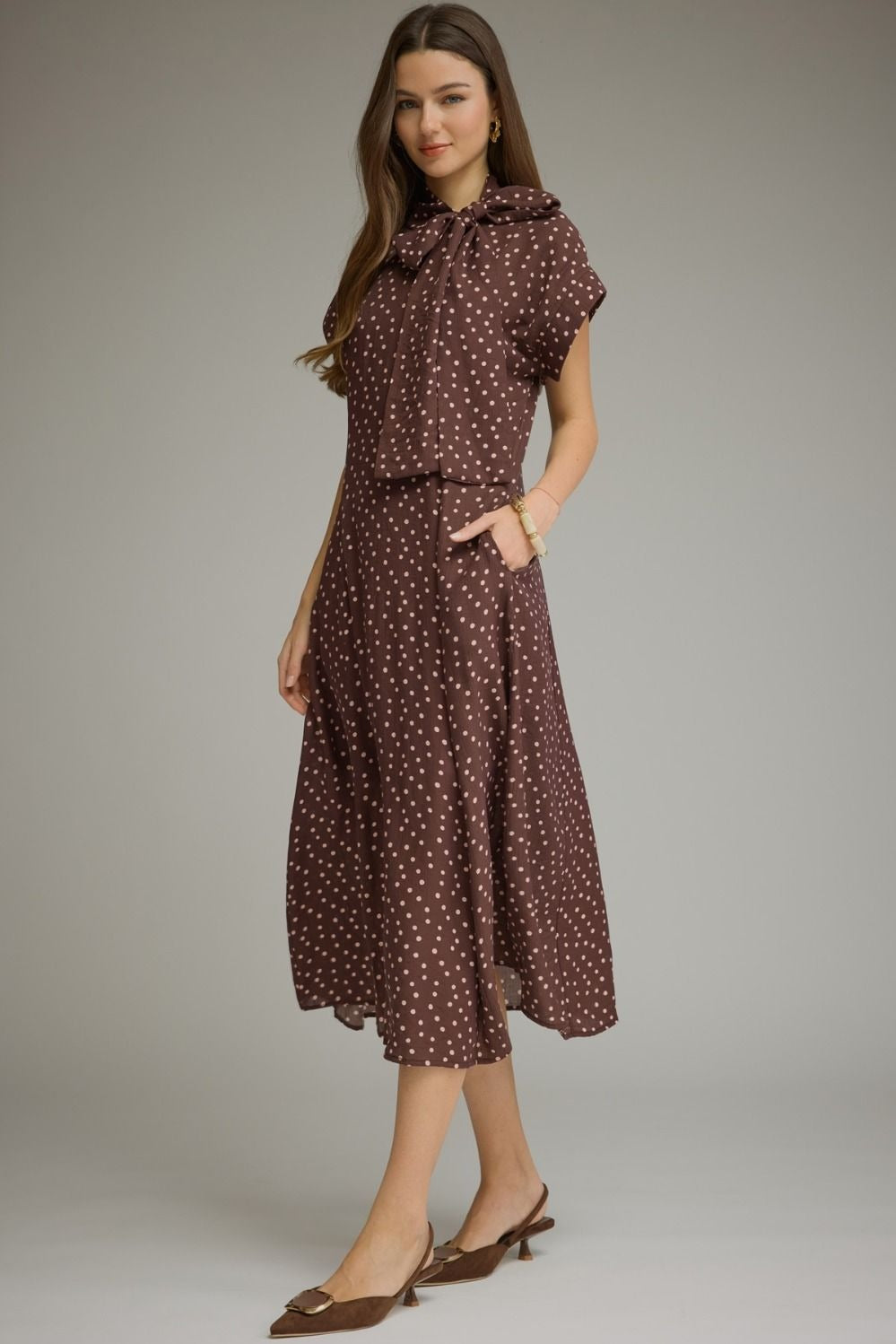 Polka dot short sleeve midi dress featuring a self-tie neck