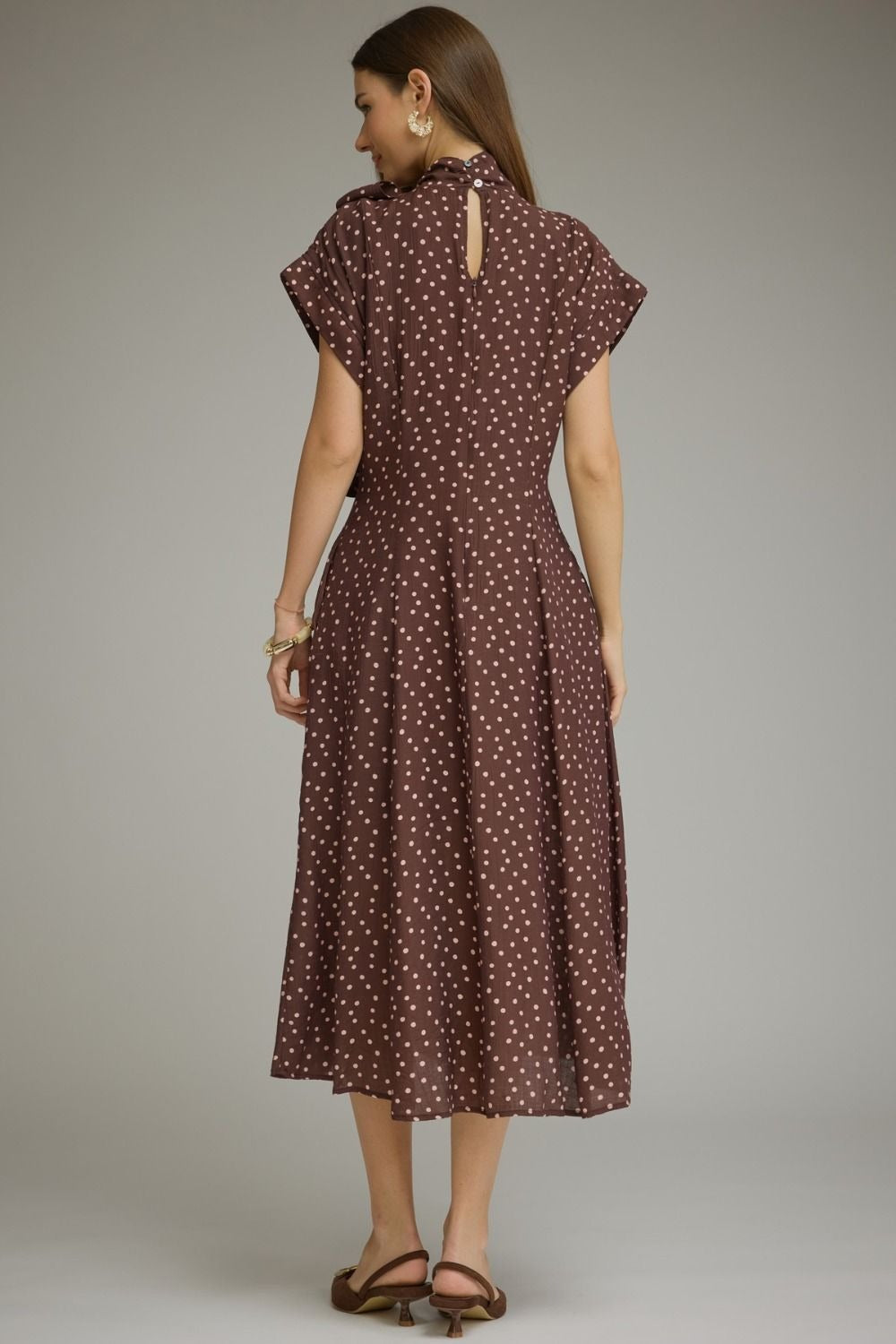 Polka dot short sleeve midi dress featuring a self-tie neck