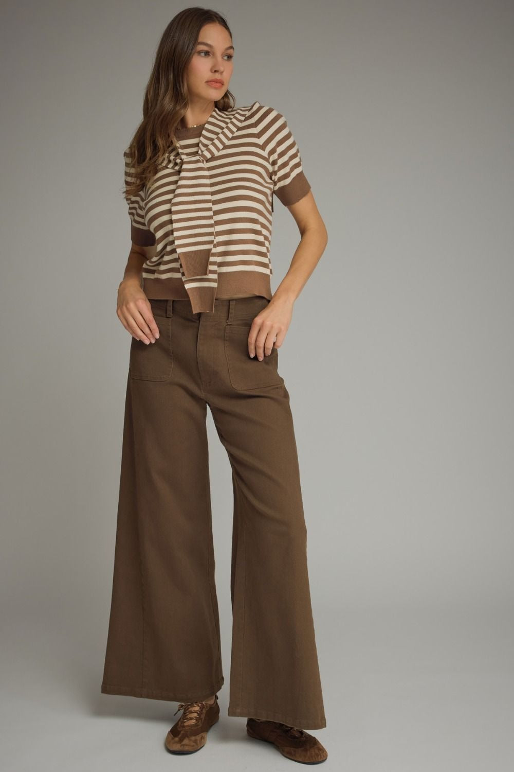 Solid knit wide leg pants featuring front pockets