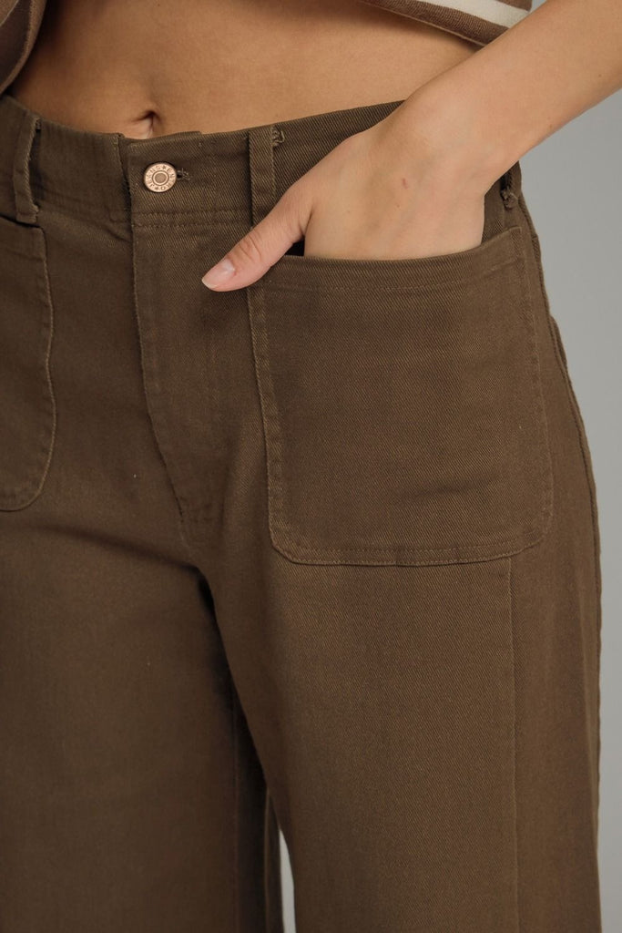 Solid knit wide leg pants featuring front pockets