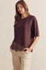 Solid short sleeve knit top featuring scallop lace hem detail
