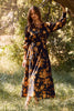 Floral printed tiered maxi dress with elastic waist and buttoned neckline