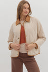 Diamond pattern quilted jacket with contrast collar adn binding detail