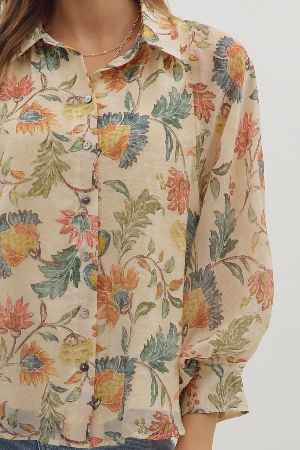 Floral print button-down top featuring dropped shoulders