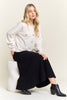 Shimmering gold-button front cardigan sweater
