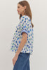 Floral print short puff sleeve top featuring contrast striped binding along V-neck