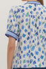 Floral print short puff sleeve top featuring contrast striped binding along V-neck