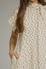Polka dot short sleeve midi dress featuring a self-tie neck