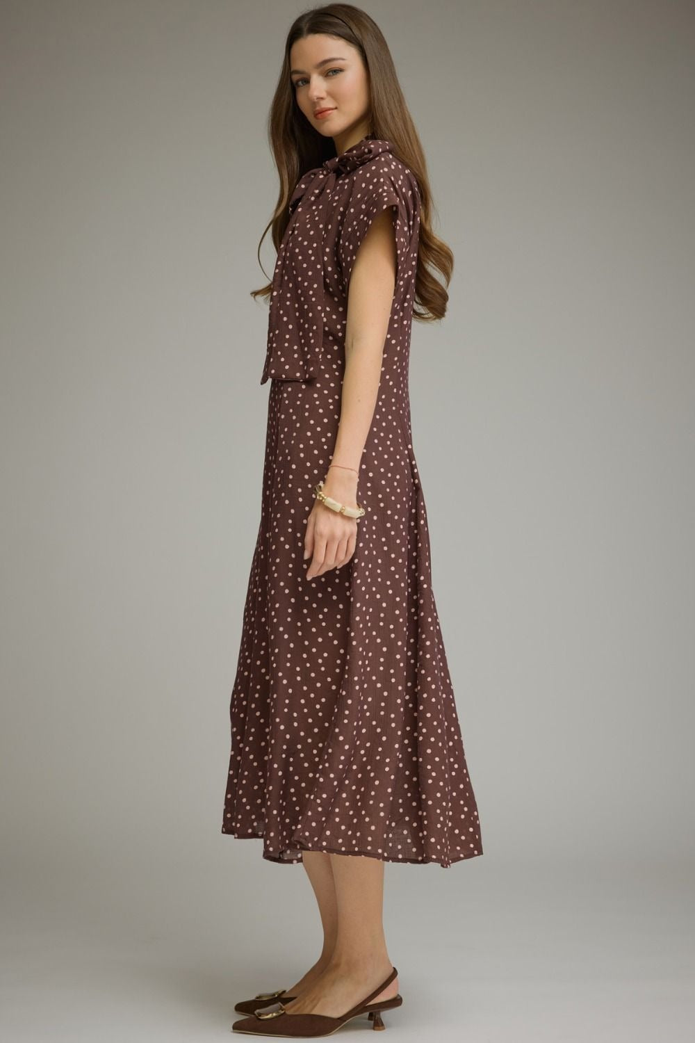 Polka dot short sleeve midi dress featuring a self-tie neck