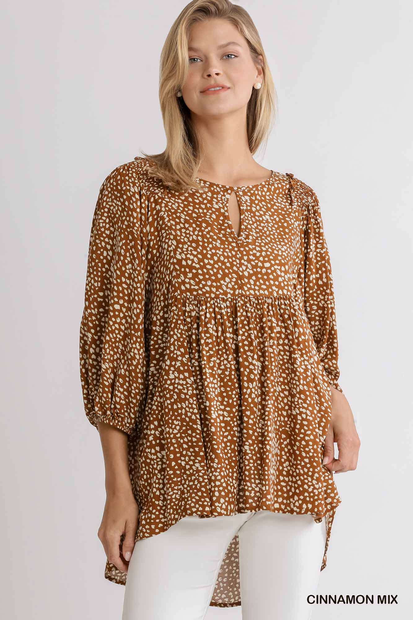 Animal Print 3/4 Sleeve Babydoll Top with Keyhole Front and Smocked Shoulder Detail  Ivy and Pearl Boutique Cinnamon S 
