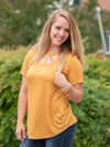 Caged in tee t-shirt  Ivy and Pearl Boutique Mustard Yellow S 