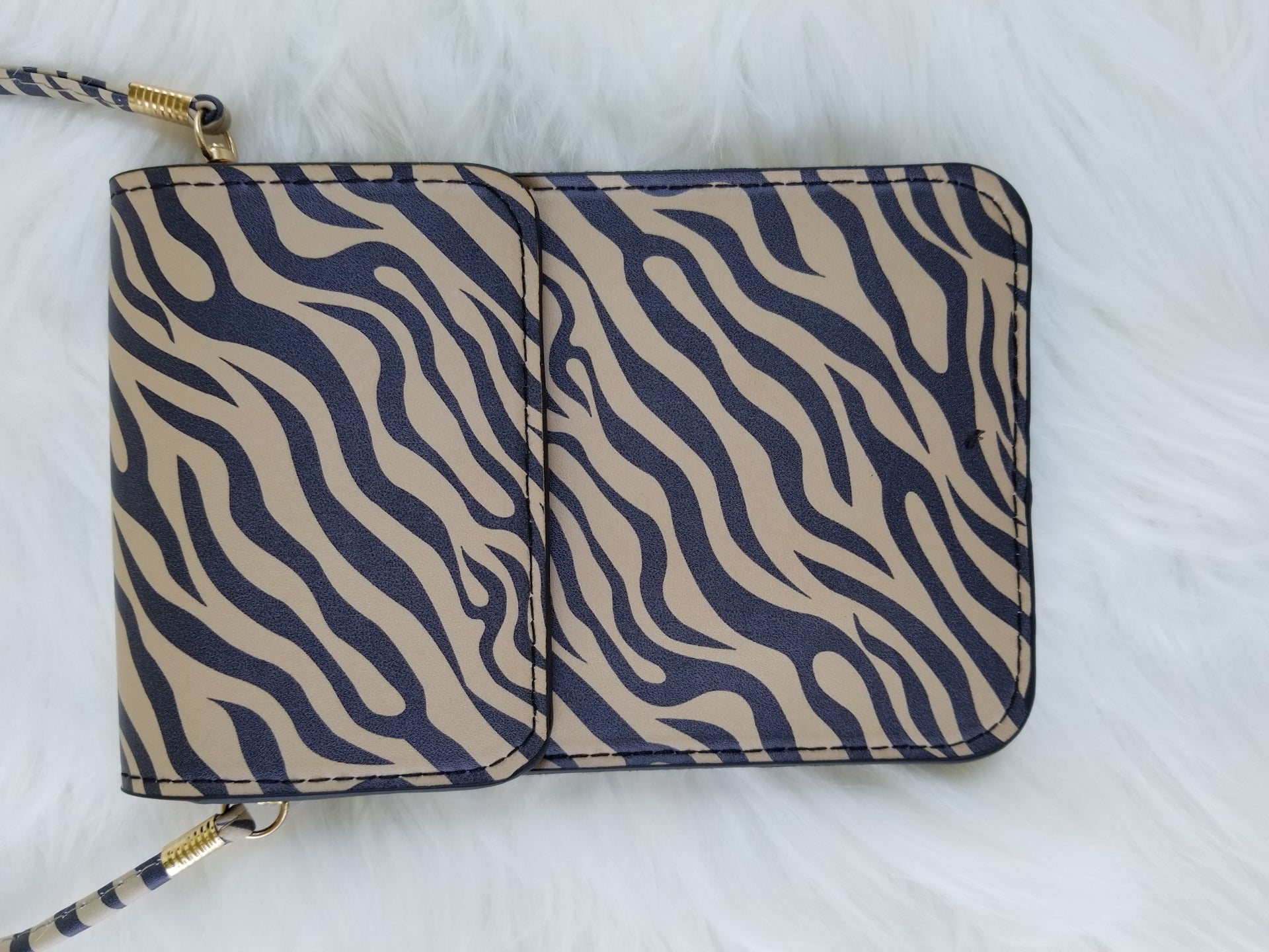 Cellphone cross-body purse with zebra print  Ivy and Pearl Boutique   
