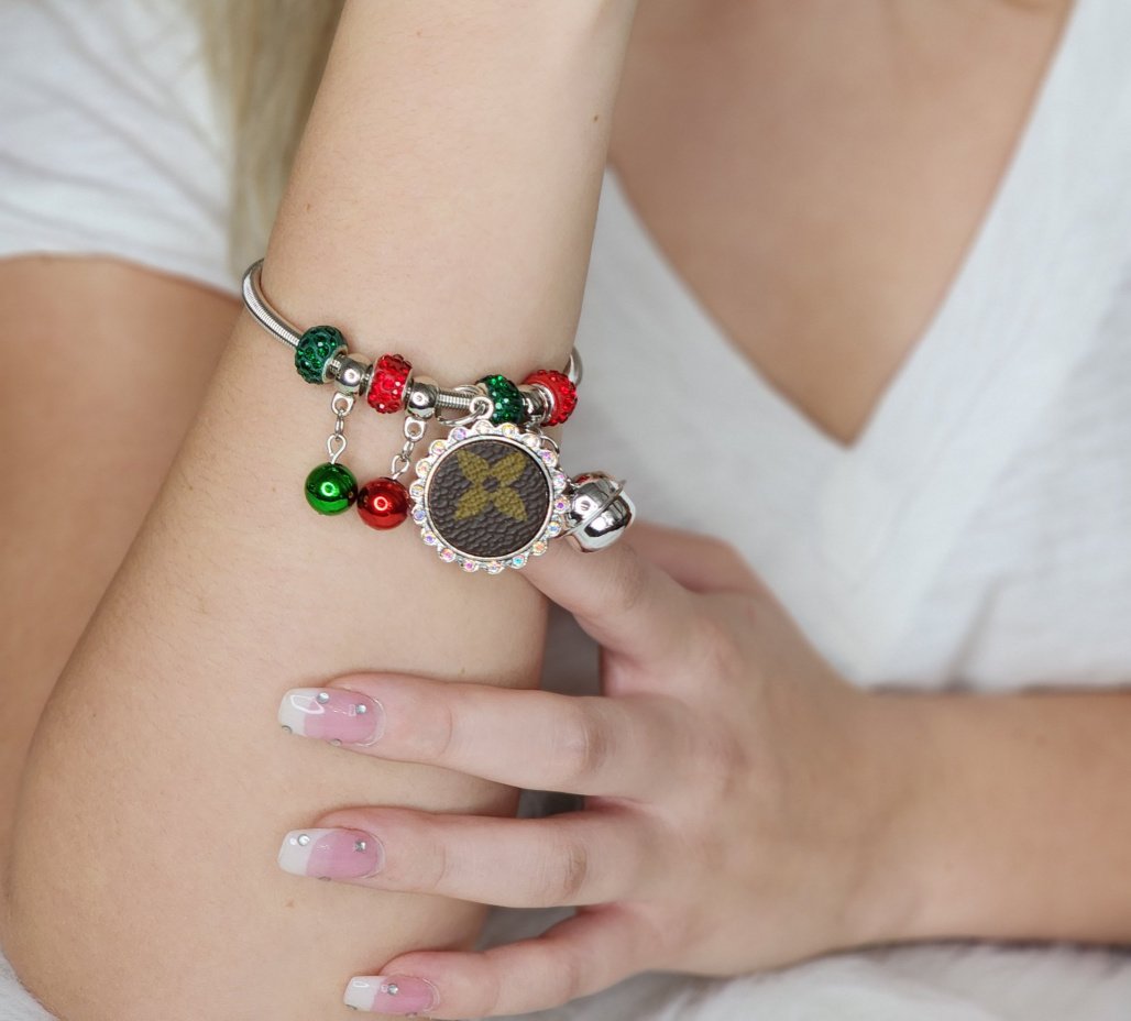 Christmas colors crystal, bells, balls, and cubic zirconia decorated vinyl pendant bracelet (silver or gold)  Ivy and Pearl Boutique Silver  