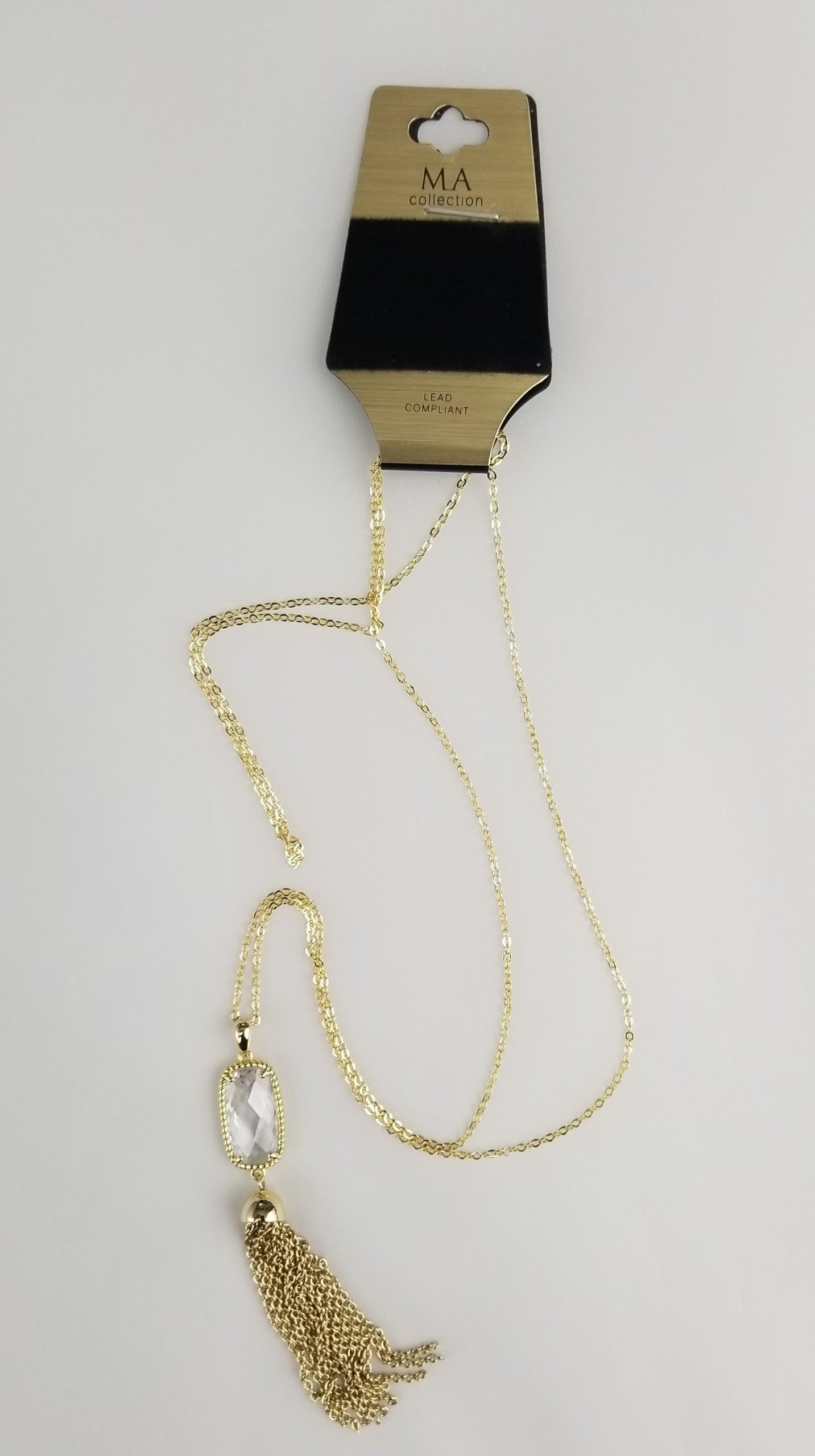 Faceted faux-diamond necklace with golden rope trim and linked chain tassel  Ivy and Pearl Boutique   