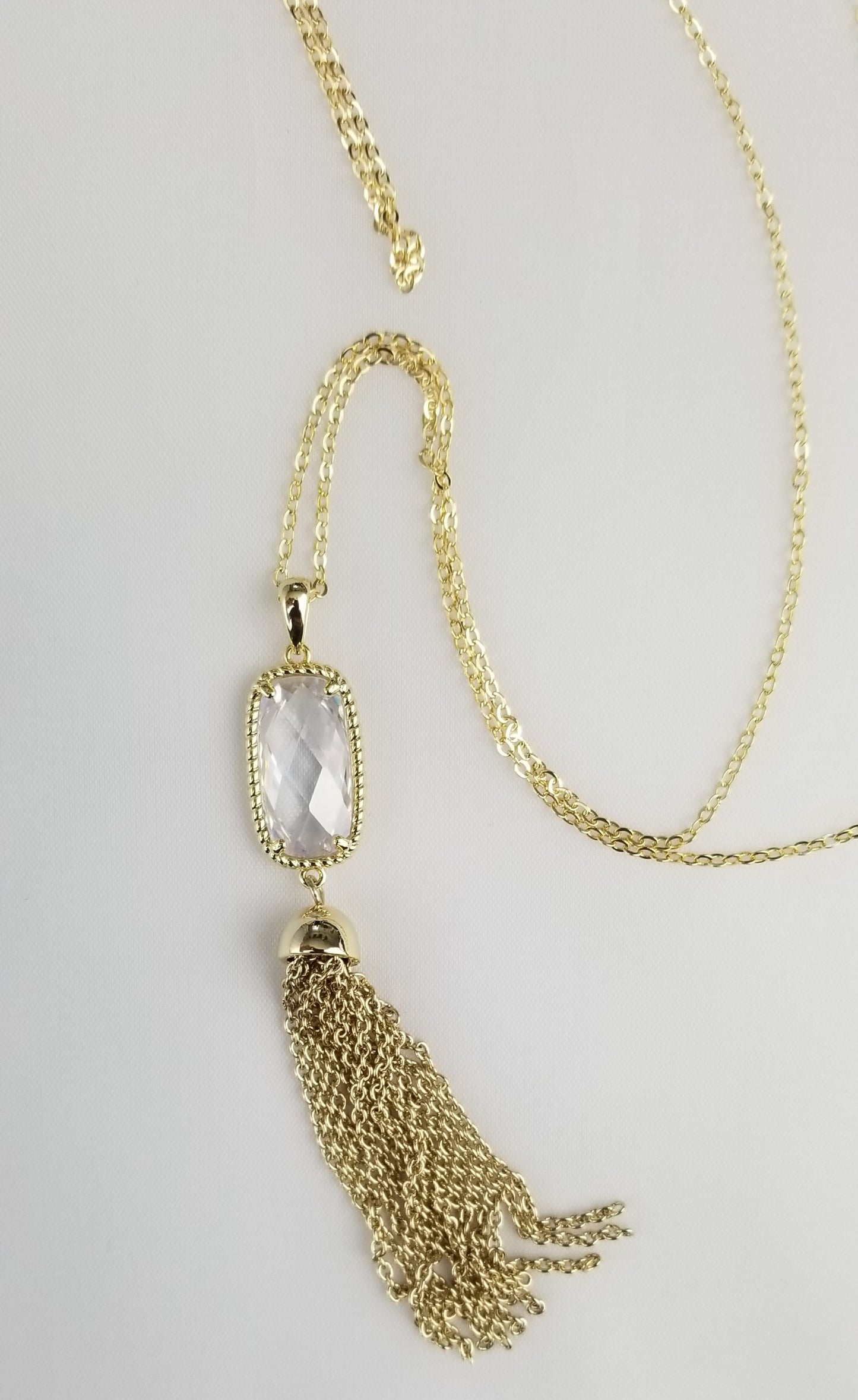 Faceted faux-diamond necklace with golden rope trim and linked chain tassel  Ivy and Pearl Boutique   