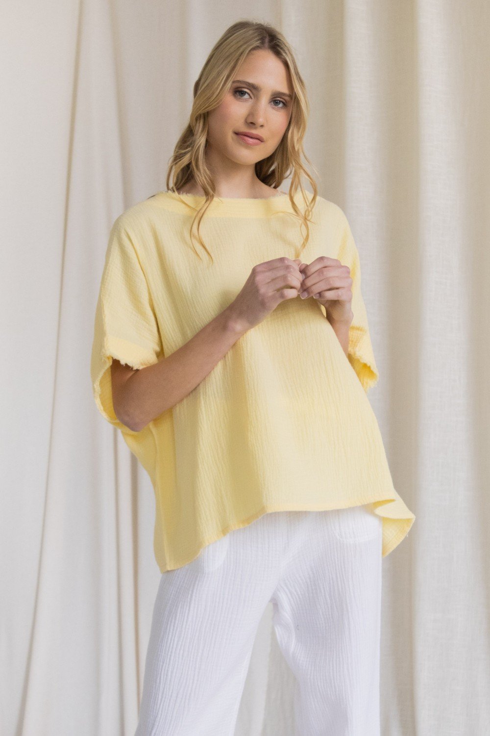 Gauze raw edge poncho top  Ivy and Pearl Boutique   