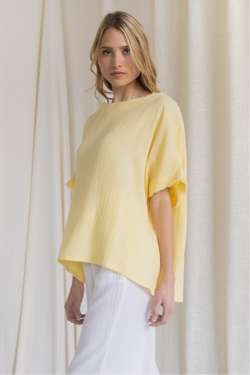 Gauze raw edge poncho top  Ivy and Pearl Boutique   