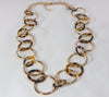 Gold and marbled tortoise-shell acetate ring necklace  Ivy and Pearl Boutique   