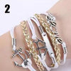 Handmade leather braided bracelet with variety of charms  Ivy and Pearl Boutique   