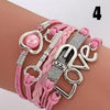 Handmade leather braided bracelet with variety of charms  Ivy and Pearl Boutique   