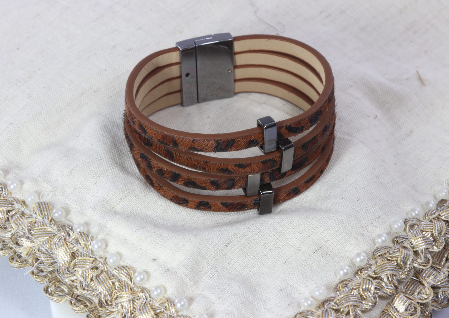 Leopard print faux-leather bracelet with magnetic clasp  Ivy and Pearl Boutique   