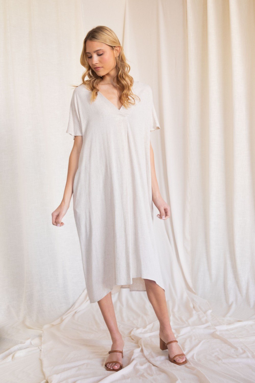 Linen maxi dress with a v neckline and side pockets (multiple colors available)  Ivy and Pearl Boutique   