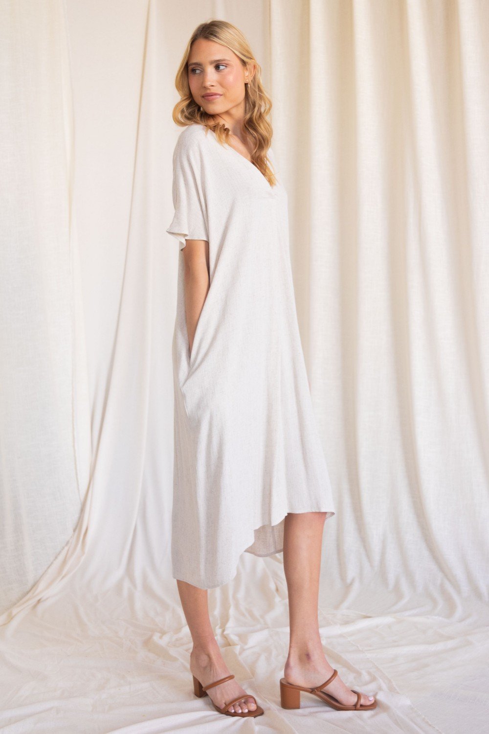 Linen maxi dress with a v neckline and side pockets multiple colors a