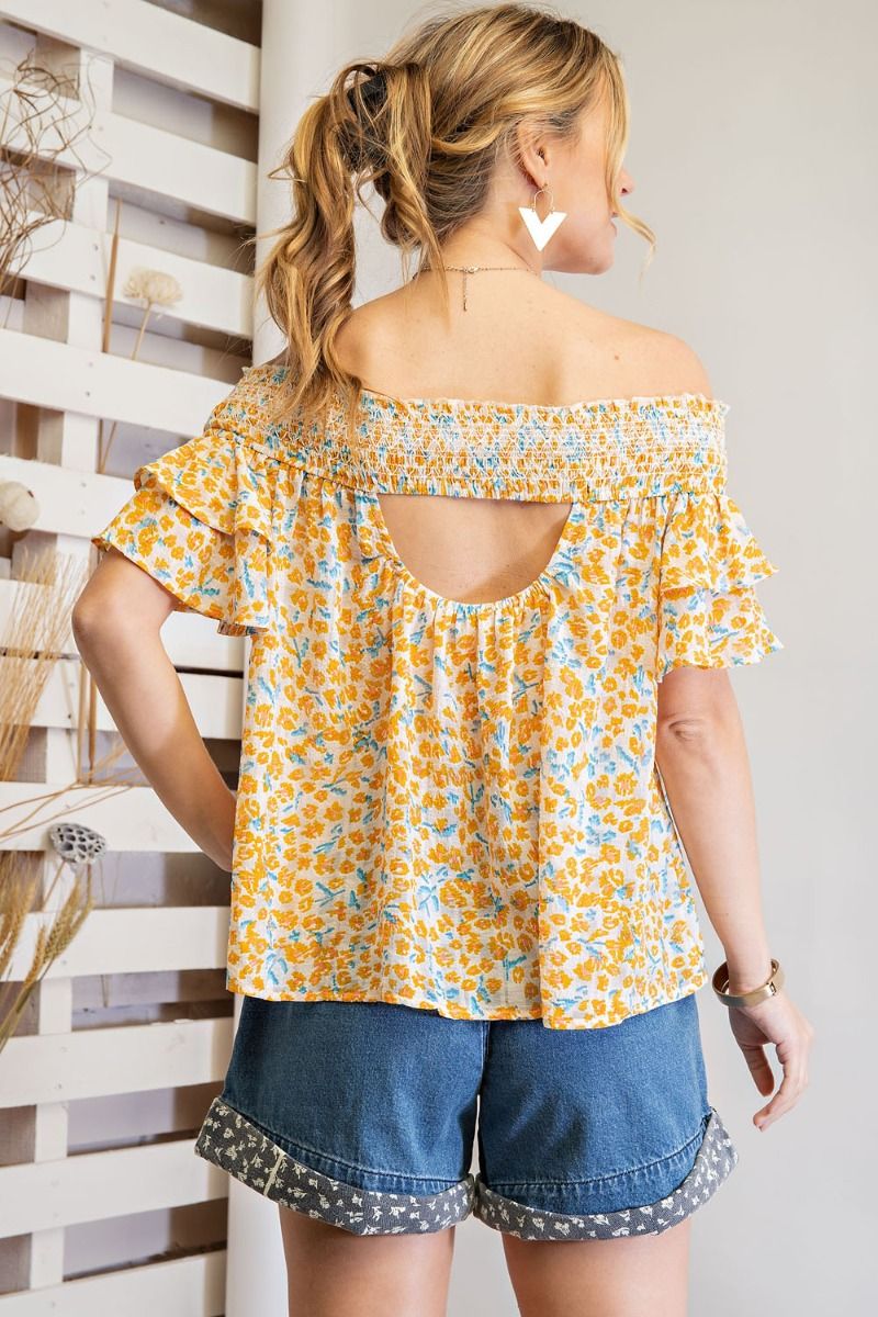 Off shoulder loose fit top with ruffled sleeves and smocked neckline  Ivy and Pearl Boutique   