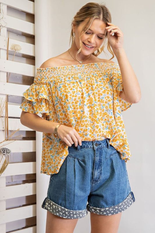 Off shoulder loose fit top with ruffled sleeves and smocked neckline  Ivy and Pearl Boutique S Butter Cream 