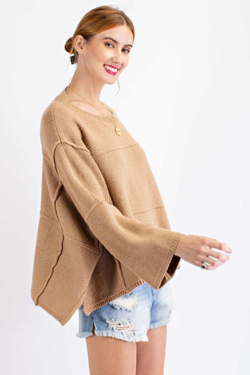 Oversized wide sleeve sweater with rounded neckline