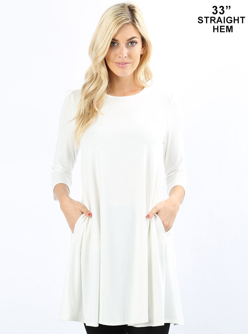 Three quarter sleeve swing tunic with side pockets  Ivy and Pearl Boutique Ivory S 