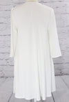 Three quarter sleeve swing tunic with side pockets  Ivy and Pearl Boutique   