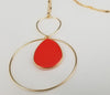 Red teardrop dangle earrings with golden trim  Ivy and Pearl Boutique   
