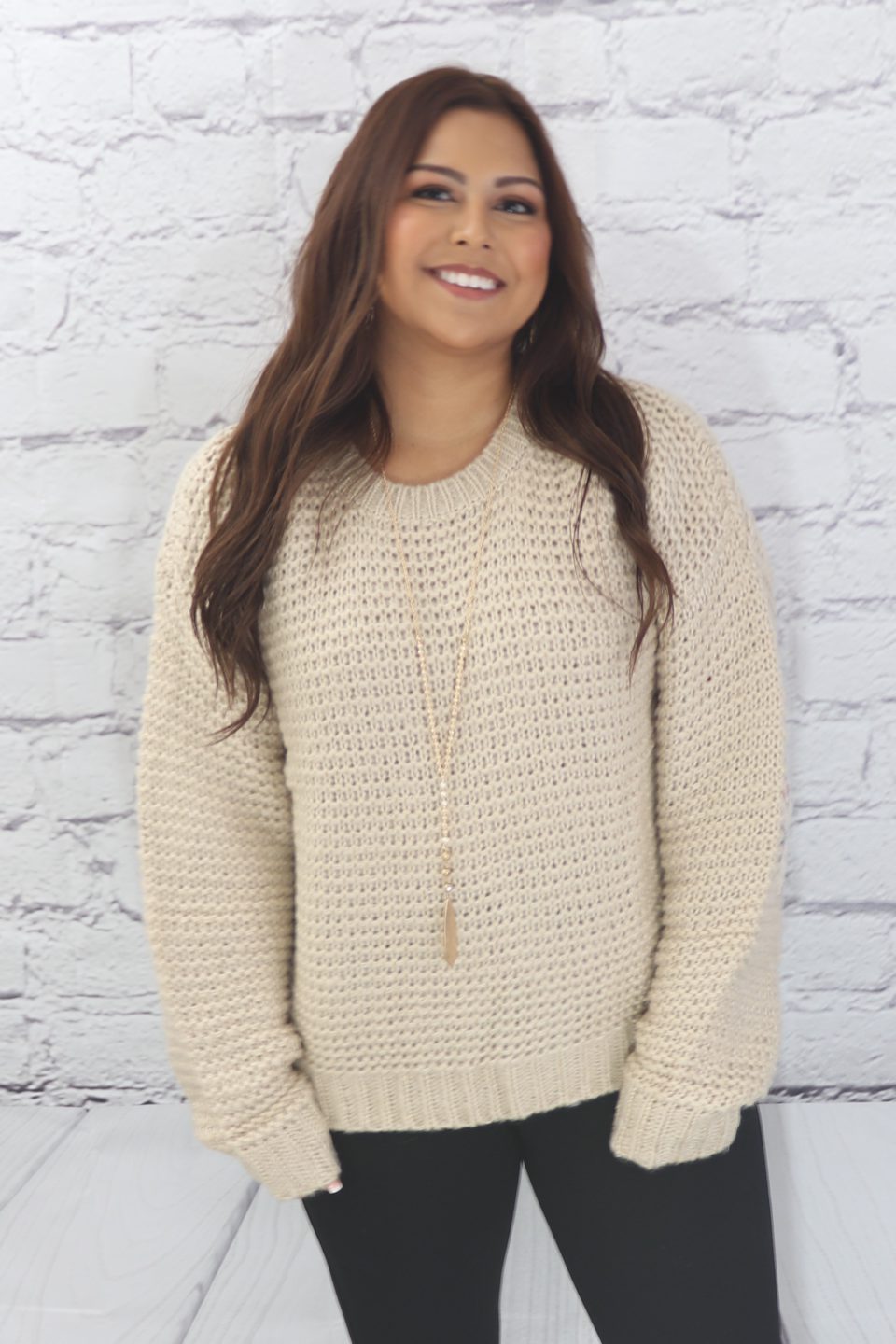 Basic ribbed pullover sweater with multi-colored floral elbow patch  Ivy and Pearl Boutique   