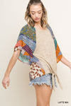 Mixed print round neck heathered knit top with layered ruffle sleeves and waist tie  Ivy and Pearl Boutique   