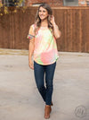 Sunny days tie-dye top with neon embroidery and fringe sleeves  Ivy and Pearl Boutique   