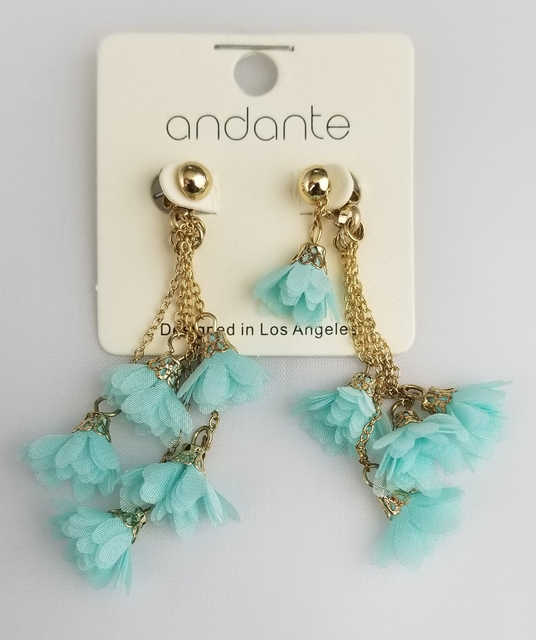 Turquoise flowers and golden chain earrings  Ivy and Pearl Boutique   