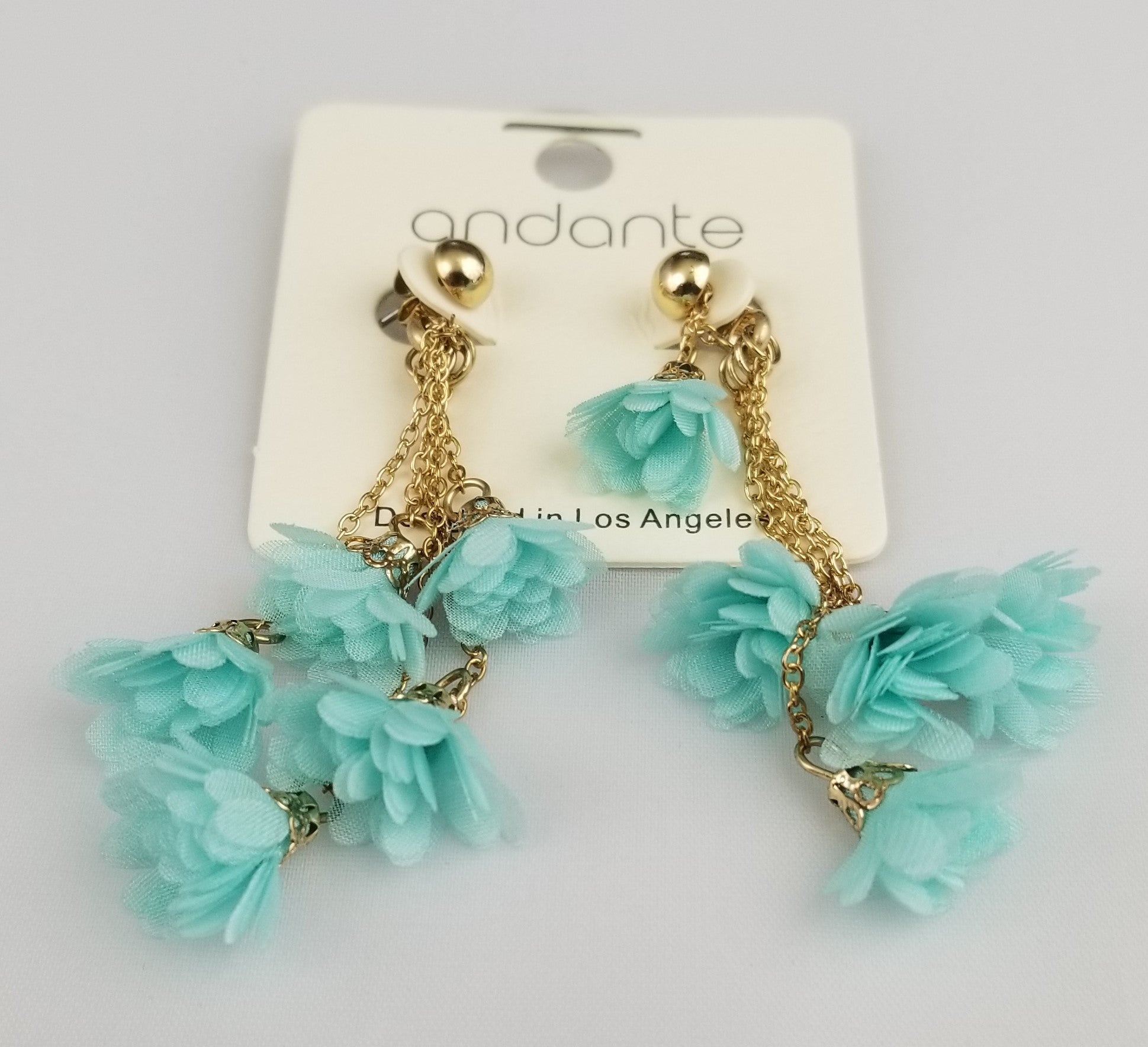 Turquoise flowers and golden chain earrings  Ivy and Pearl Boutique   