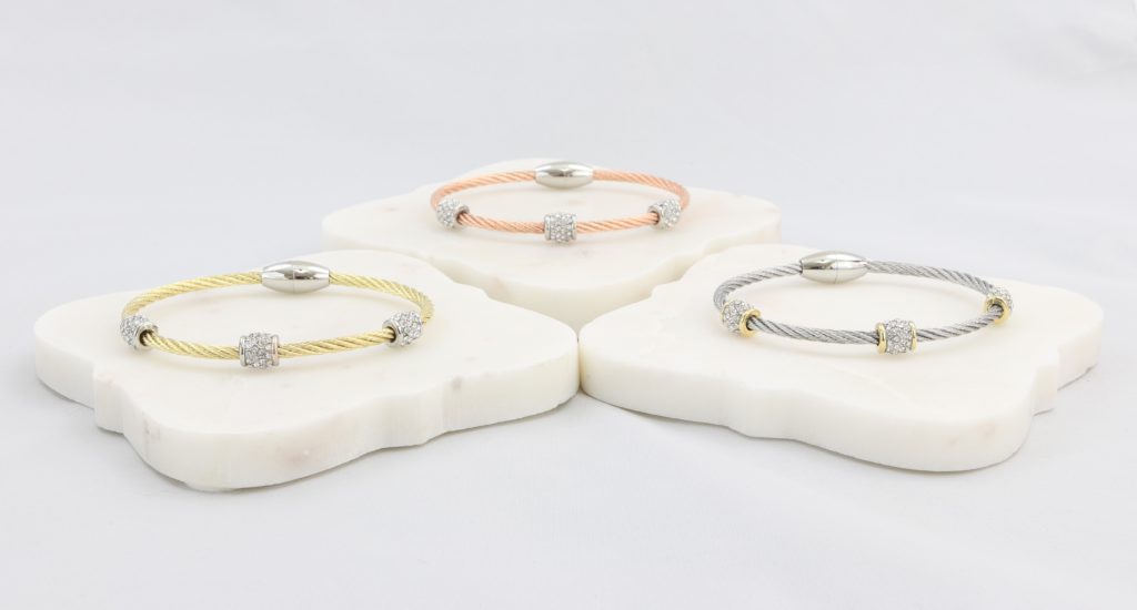 Twisted cable bracelet with barrel-clusters of synthetic diamonds and magnetic clasp  Ivy and Pearl Boutique Gold  