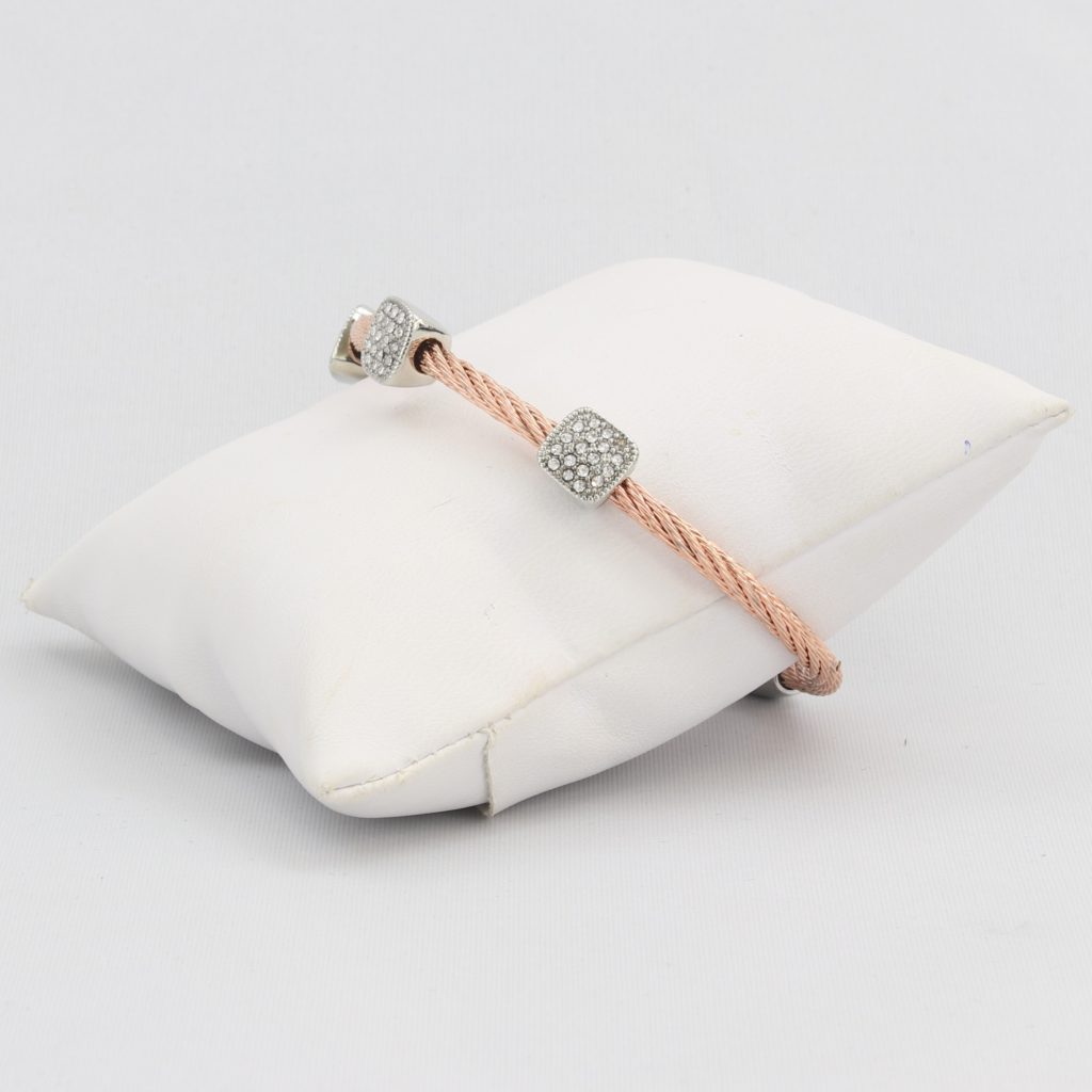 Twisted cable bracelet with square-clusters of diamond-like cubic zirconia stones  Ivy and Pearl Boutique   